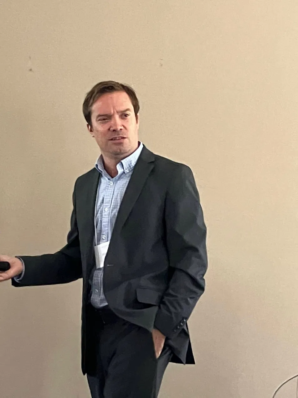 Dr. William Hahn presenting during an executive workshop